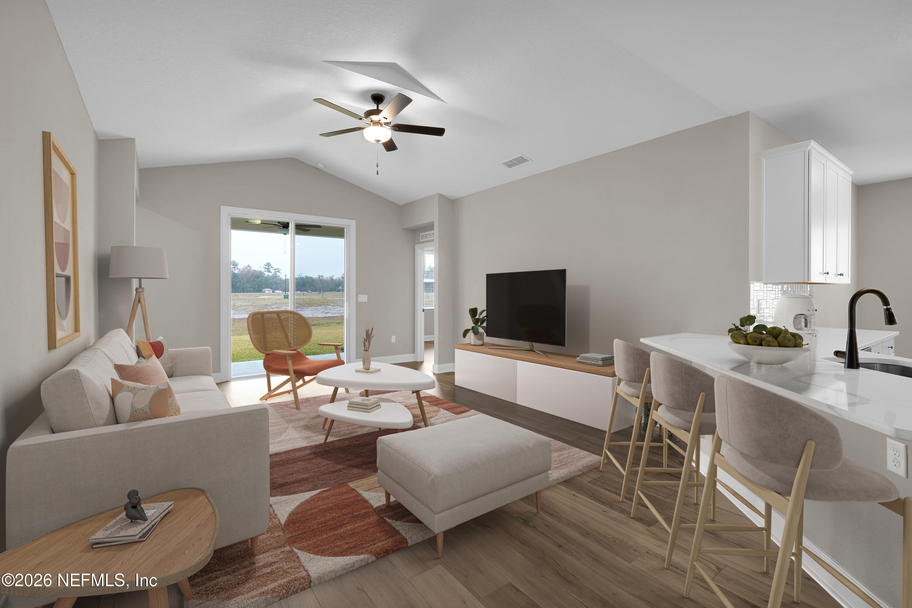 2420 Pemrose Loop Middleburg, FL 32068 - Photo 11 of 25 a living room with furniture and a flat screen tv