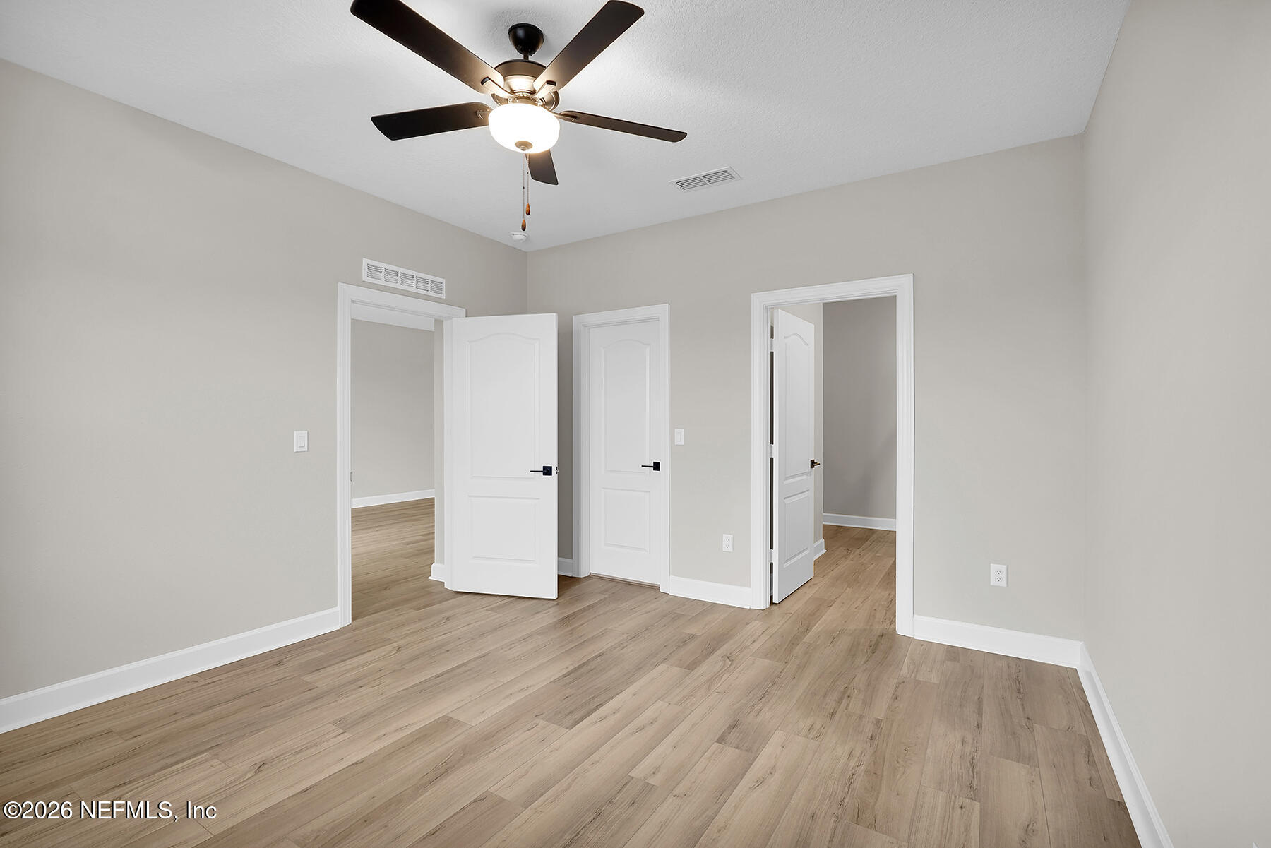 2420 Pemrose Loop Middleburg, FL 32068 - Photo 14 of 25 a view of an empty room and wooden floor