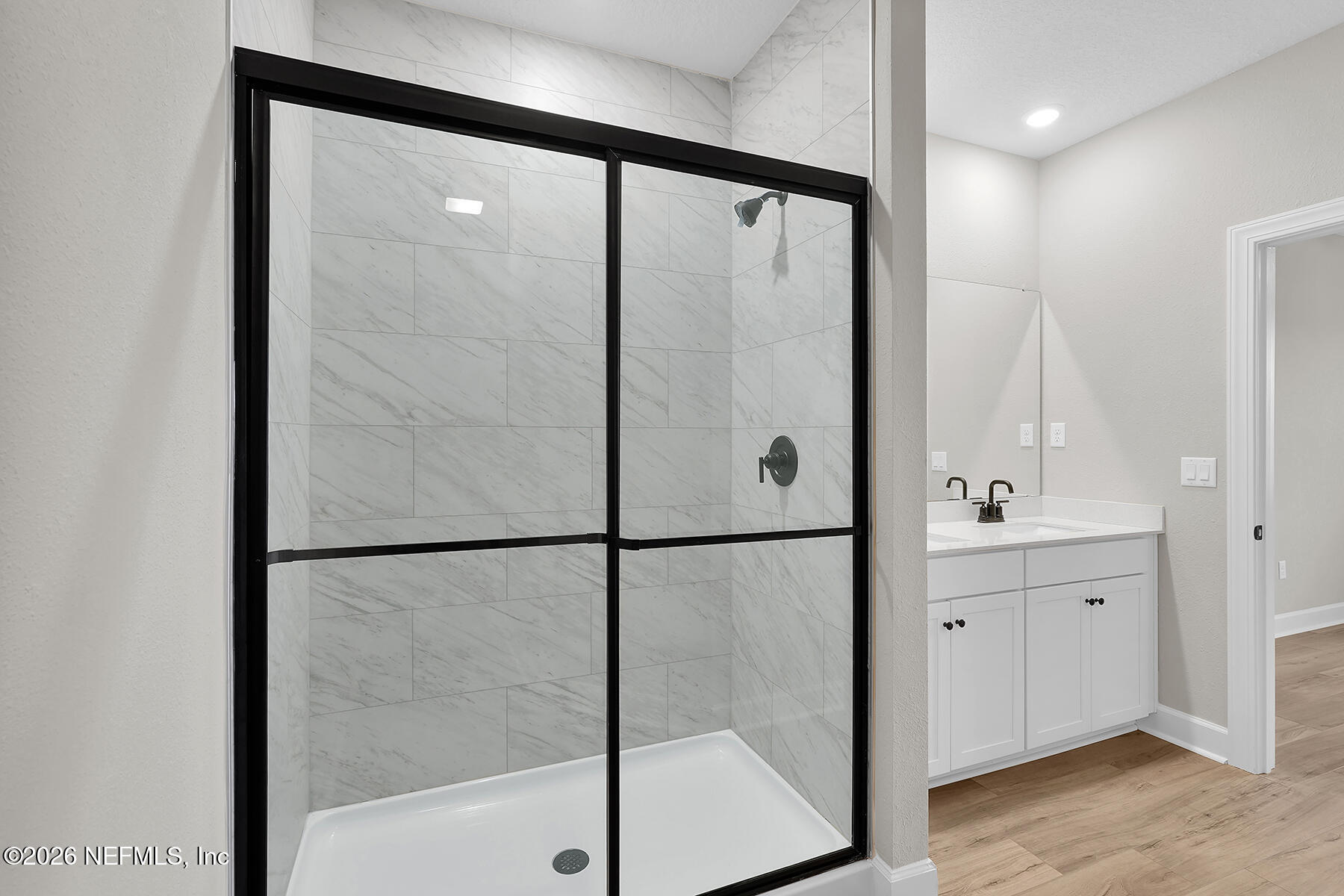 2420 Pemrose Loop Middleburg, FL 32068 - Photo 16 of 25 a bathroom with a shower and a sink