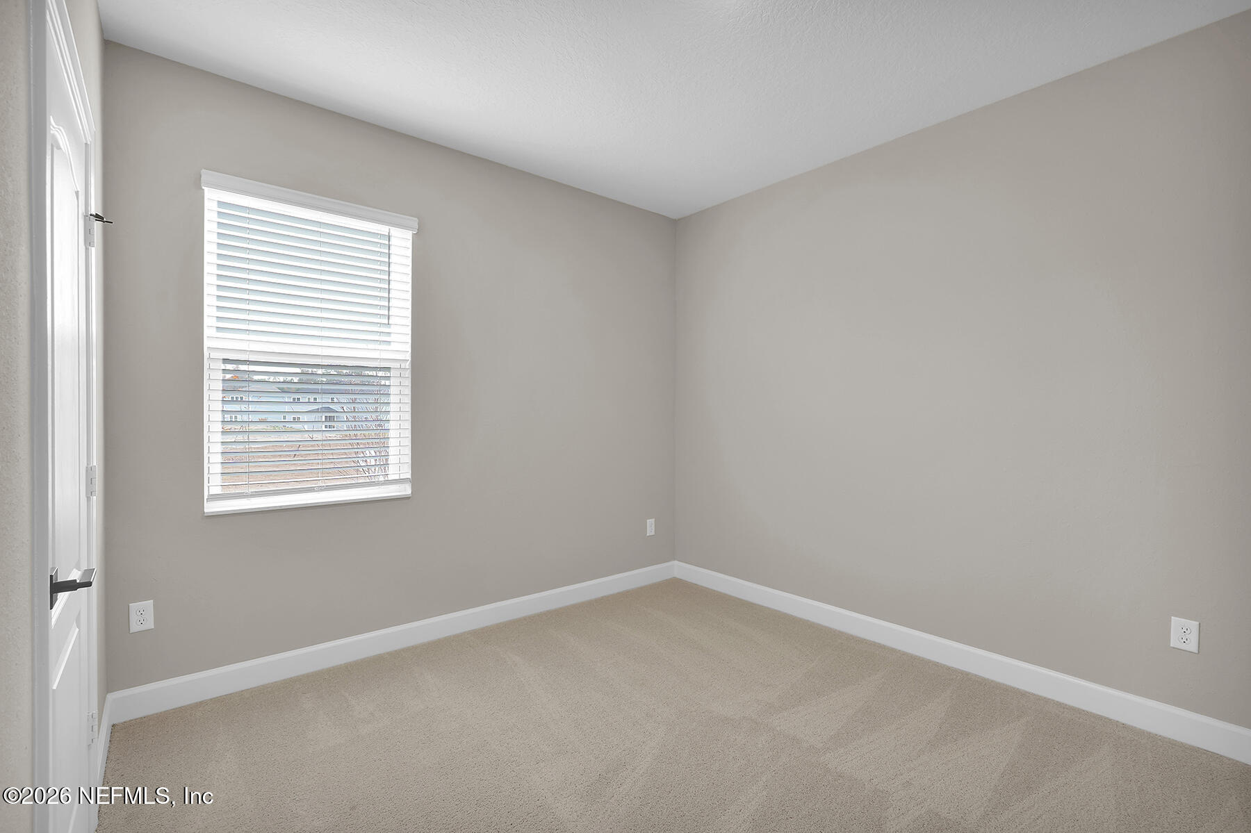 2420 Pemrose Loop Middleburg, FL 32068 - Photo 18 of 25 an empty room with a window