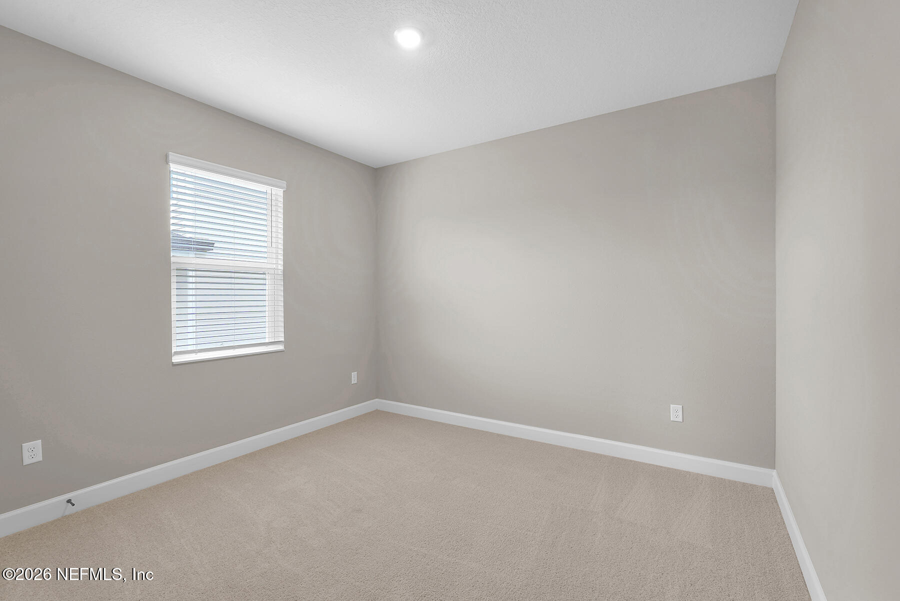 2420 Pemrose Loop Middleburg, FL 32068 - Photo 20 of 25 an empty room with a window