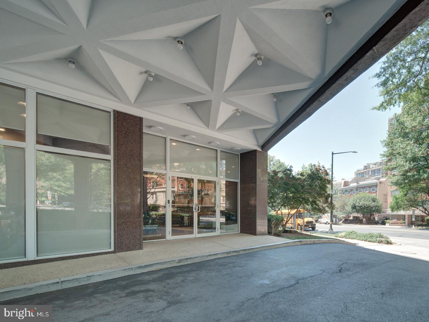 2829 Connecticut Avenue Northwest, Unit 606 Washington, DC 20008 - Photo 2 of 28 a view of a building with a floor to ceiling window and stairs