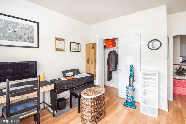 a workspace with furniture and a window