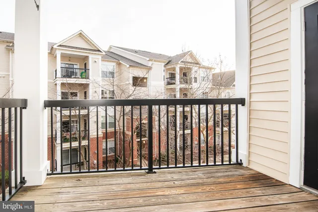 a bathroom with a sink a toilet and shower curtain