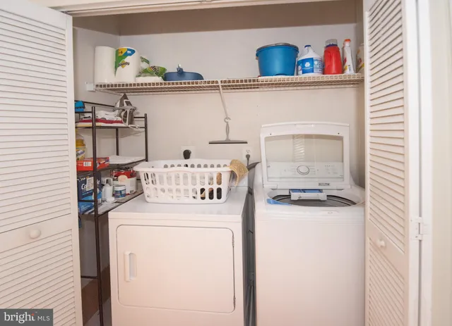 a view of backyard with wooden floor and fence