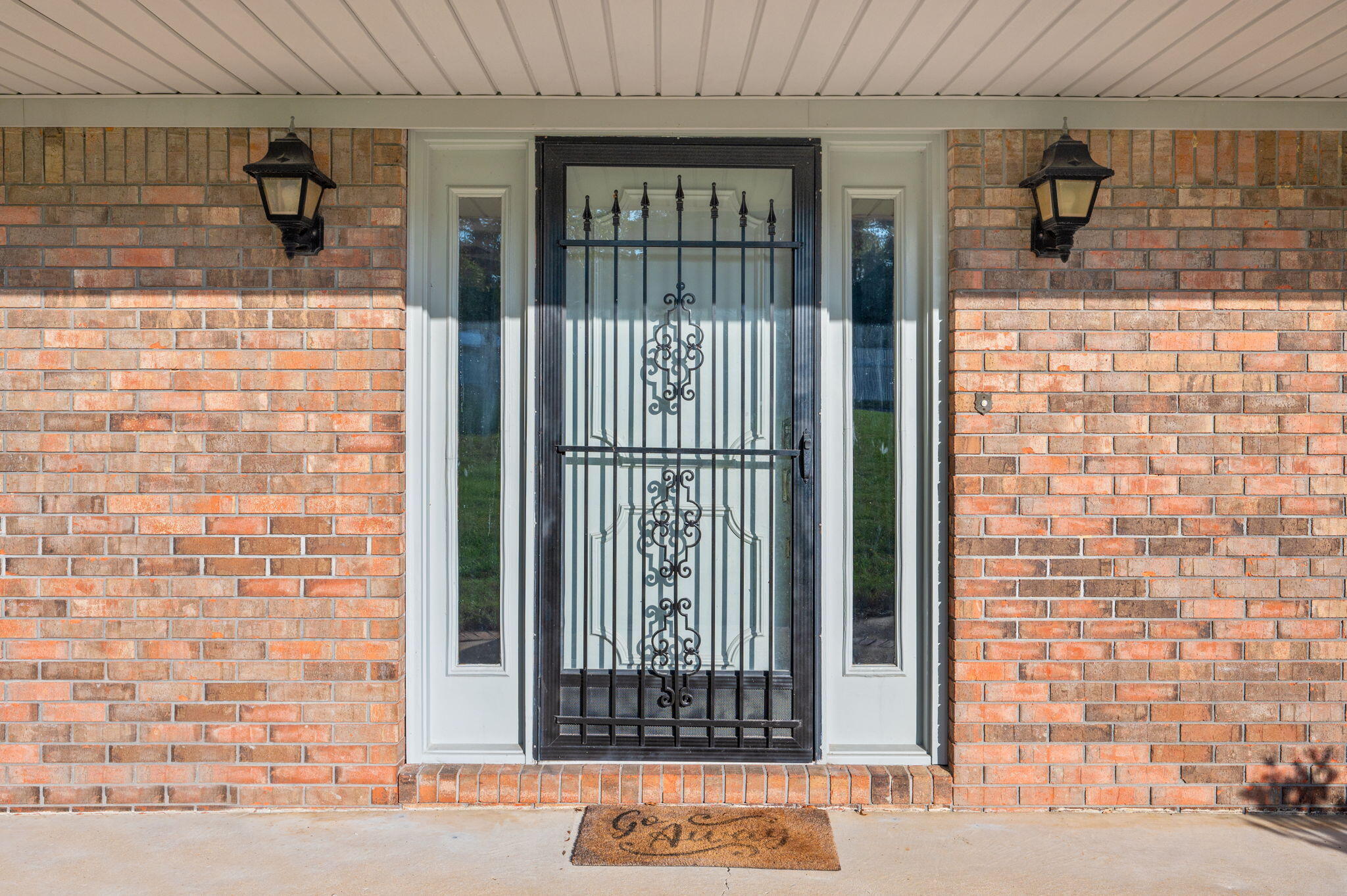 1260 East Chestnut Avenue Crestview, FL 32539 - Photo 12 of 61 a view of a brick house with a window