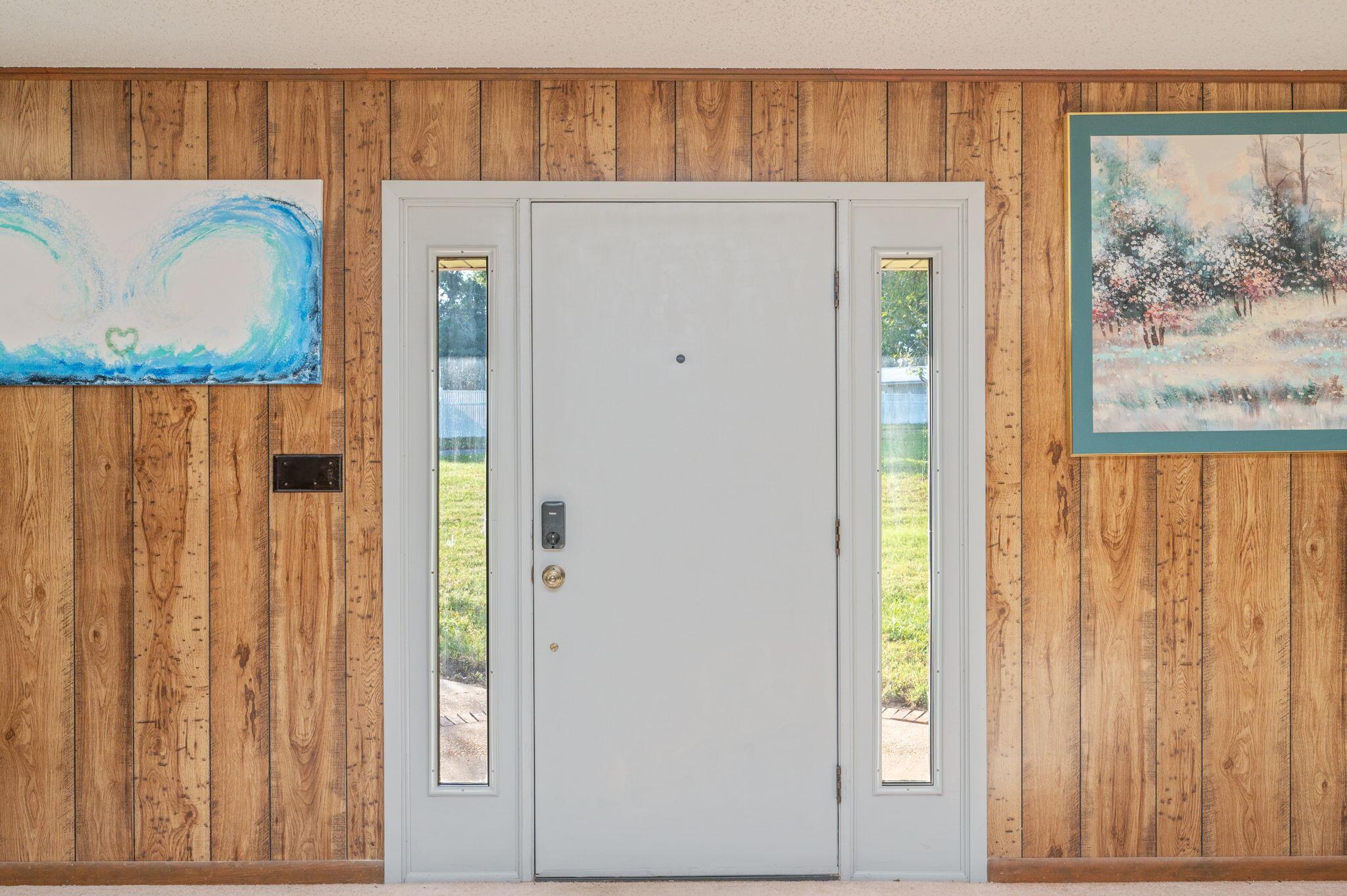1260 East Chestnut Avenue Crestview, FL 32539 - Photo 14 of 61 a white refrigerator freezer sitting inside of a kitchen
