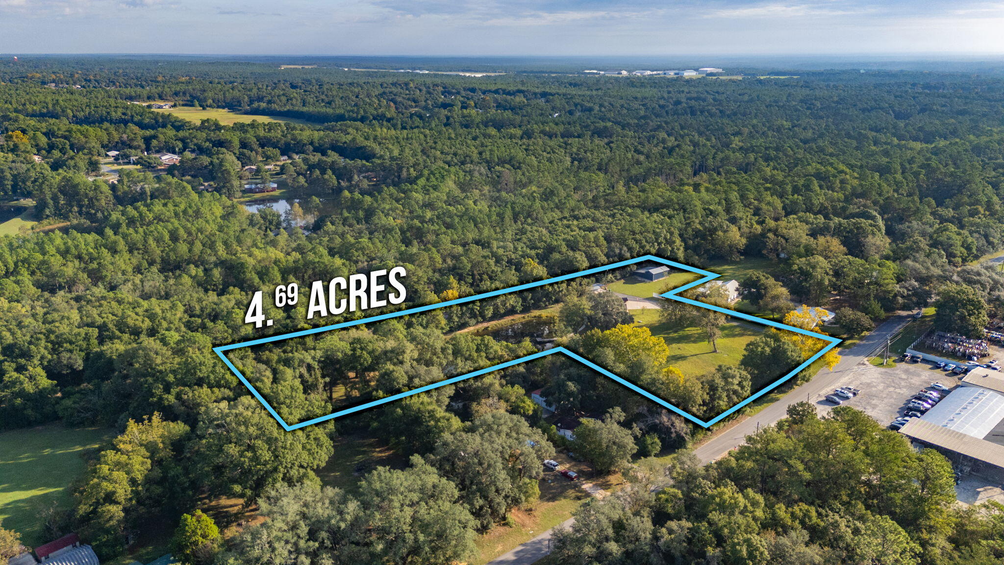 1260 East Chestnut Avenue Crestview, FL 32539 - Photo 58 of 61 an aerial view of houses and roads