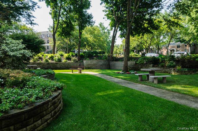 46 Terrace Circle, Unit 1B Great Neck, NY 11021 - Photo 16 of 16 a view of park with benches