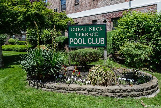 46 Terrace Circle, Unit 1B Great Neck, NY 11021 - Photo 10 of 16 a view of a sign board