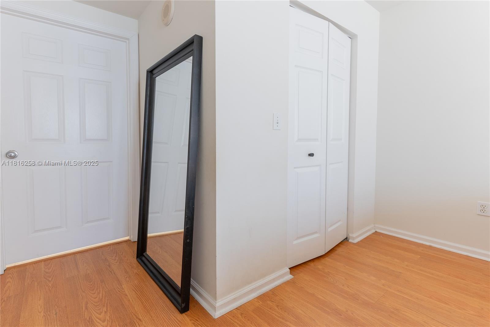 17100 North Bay Road, Unit PH1912 Sunny Isles Beach, FL 33160 - Photo 18 of 39 a view of empty room with wooden floor