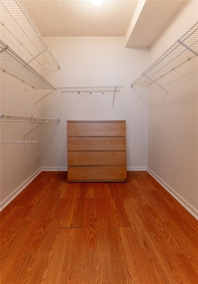 17100 North Bay Road, Unit PH1912 Sunny Isles Beach, FL 33160 - Photo 19 of 39 a view of room with hardwood floor