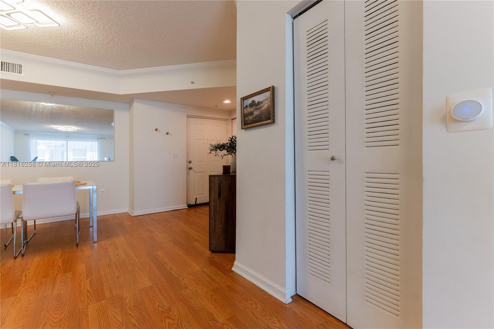 17100 North Bay Road, Unit PH1912 Sunny Isles Beach, FL 33160 - Photo 31 of 39 a view of a livingroom with furniture and a hardwood floor