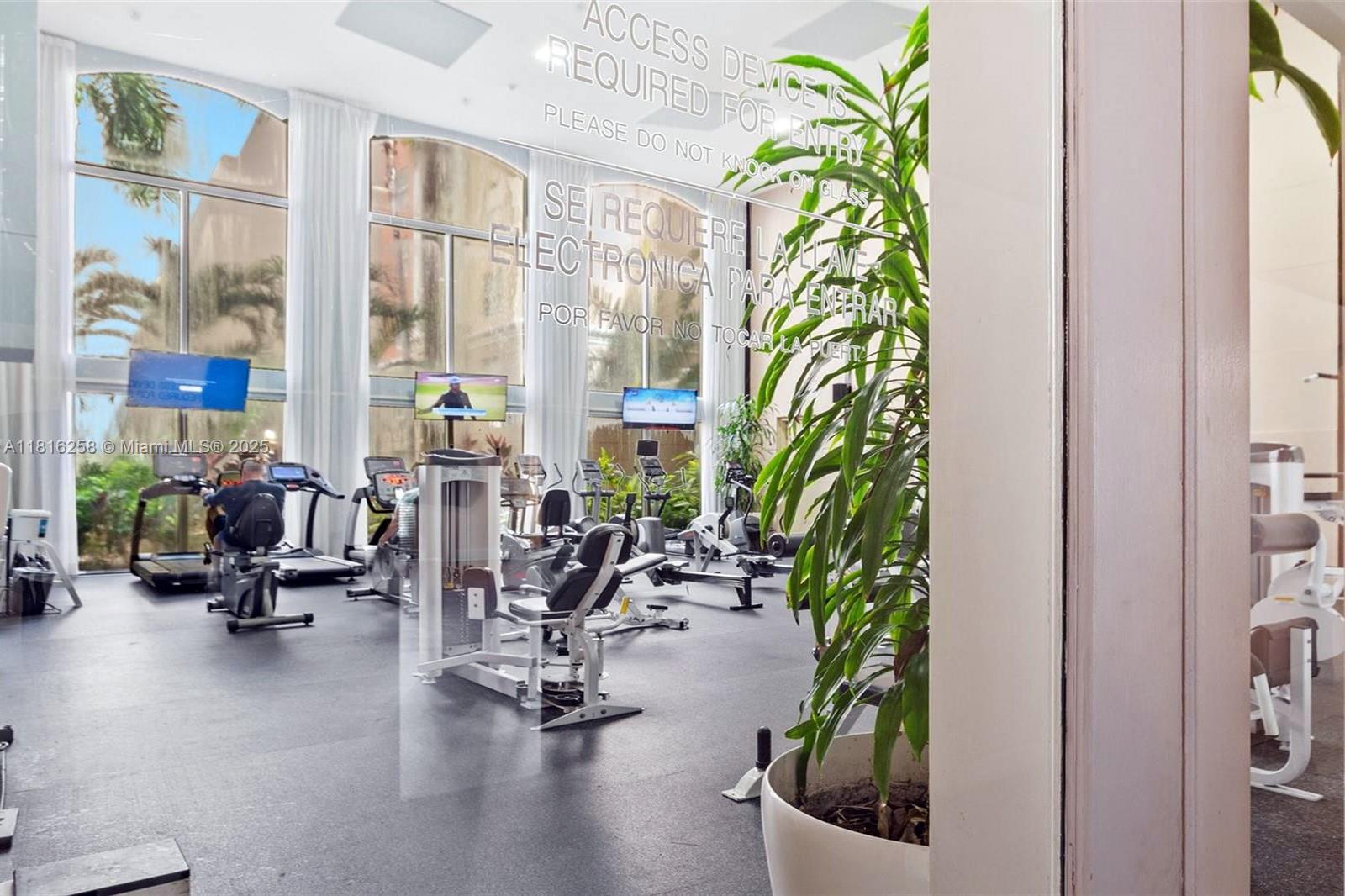 17100 North Bay Road, Unit PH1912 Sunny Isles Beach, FL 33160 - Photo 35 of 39 a view of a room with gym equipment