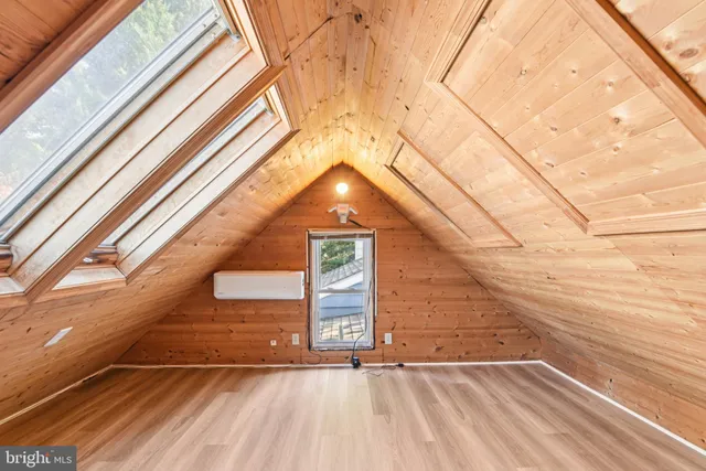 a view of outdoor space with wooden floor