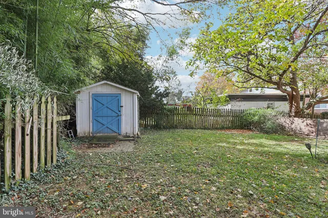 a fire hydrant in the middle of a field