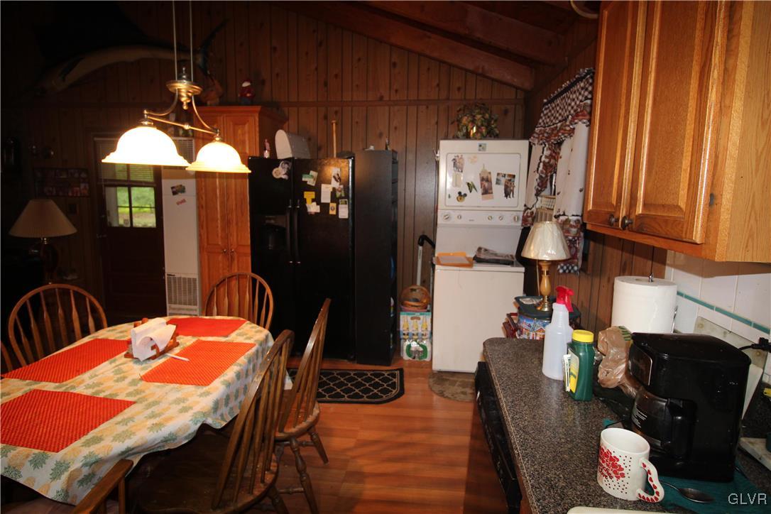 157 Maple Road Blakeslee, PA 18610 - Photo 8 of 19 a dining room with furniture and wooden floor