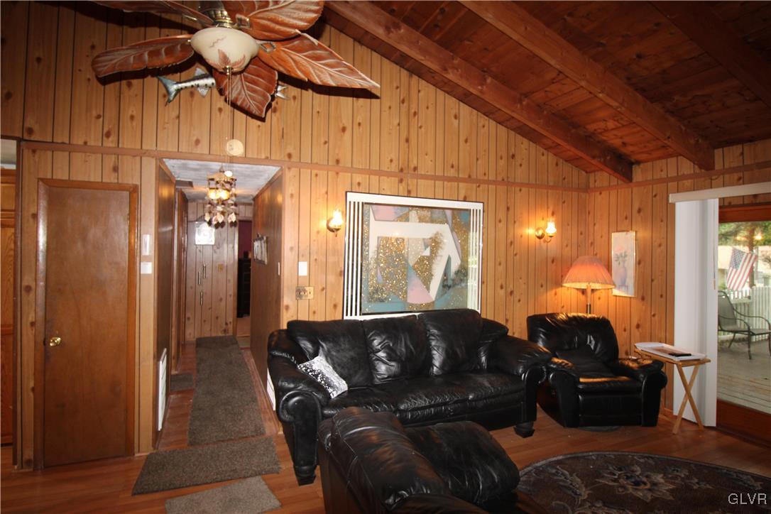 157 Maple Road Blakeslee, PA 18610 - Photo 9 of 19 a living room with furniture and a mirror