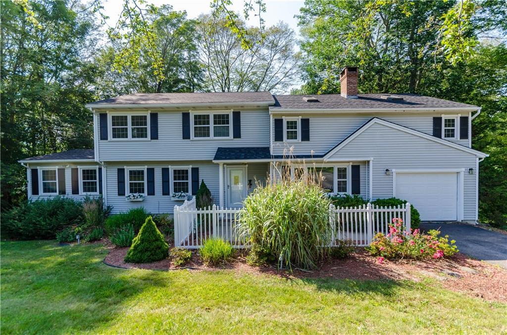 27 Webster Road East Lyme, CT 06333 - Photo 1 of 1 a view of a house with a yard and plants