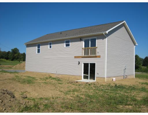 216 Shields Road Slippery Rock, PA 16057 - Photo 3 of 14 Exterior Back. EXTERIOR REAR WITH SLIDERS TO LOWER LEVEL
