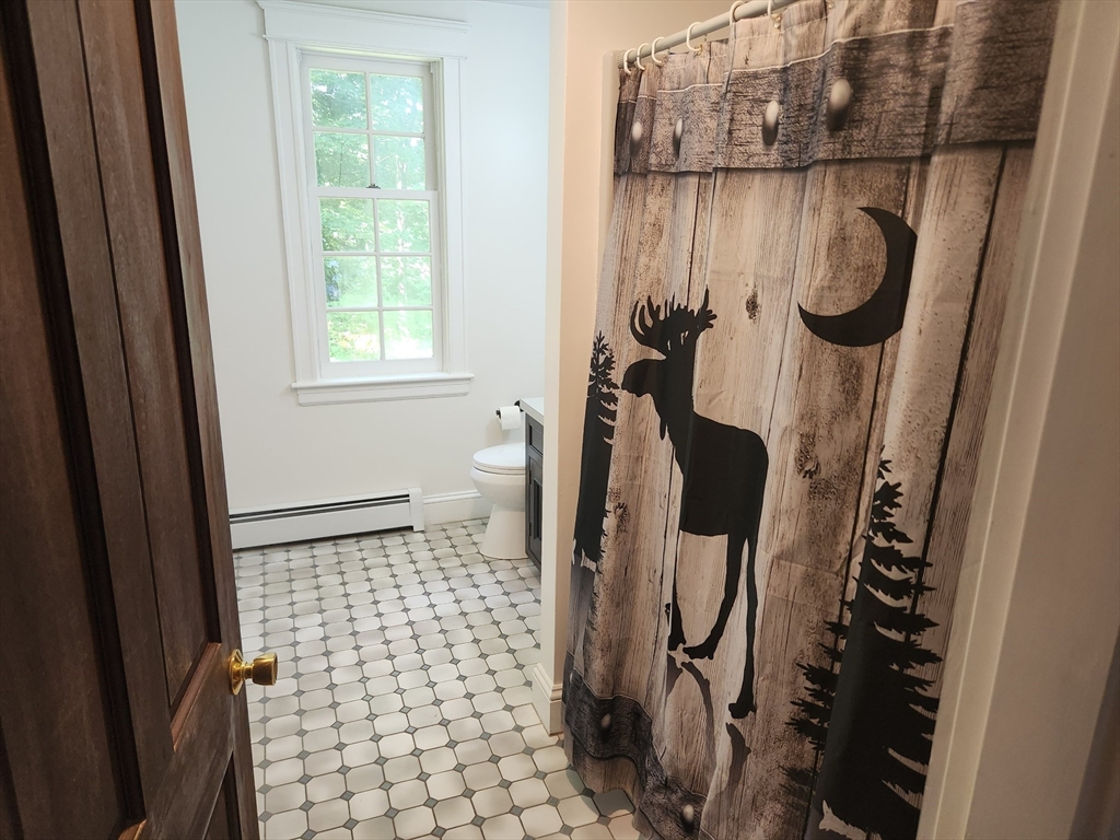 134 Mountain Road Princeton, MA 01541 - Photo 16 of 29 a bathroom with a sink toilet and shower