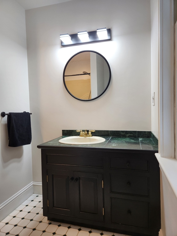 134 Mountain Road Princeton, MA 01541 - Photo 18 of 29 a bathroom with a sink and a mirror