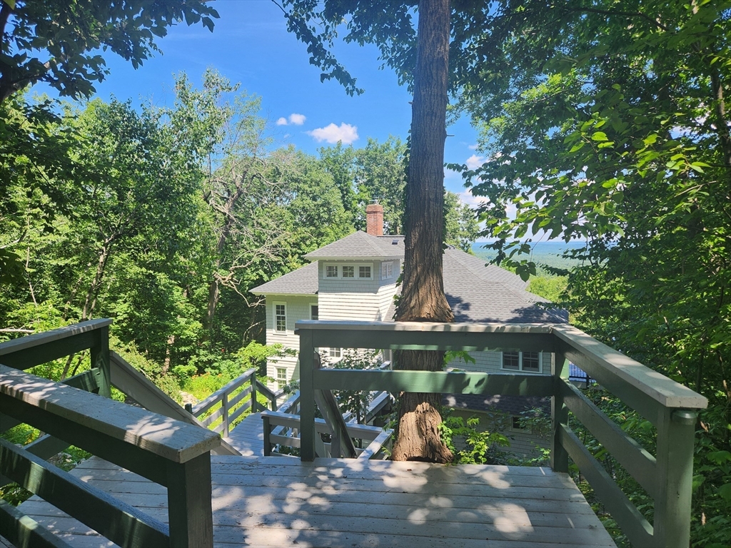 134 Mountain Road Princeton, MA 01541 - Photo 2 of 29 a view of a house with a tree in the background