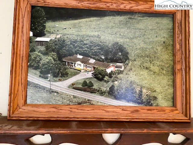 453 Smith Acres Road Ennice, NC 28623 - Photo 13 of 30 a view of a wooden door and a window