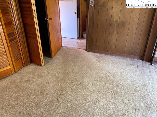 453 Smith Acres Road Ennice, NC 28623 - Photo 16 of 30 a view of a closet with wooden floor