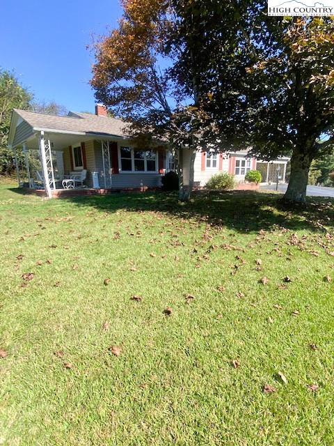 453 Smith Acres Road Ennice, NC 28623 - Photo 2 of 30 a front view of a house with a yard