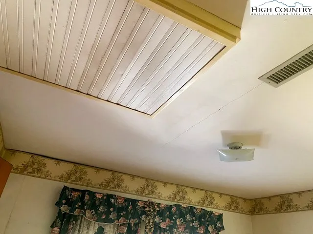 a bench sitting in front of a building