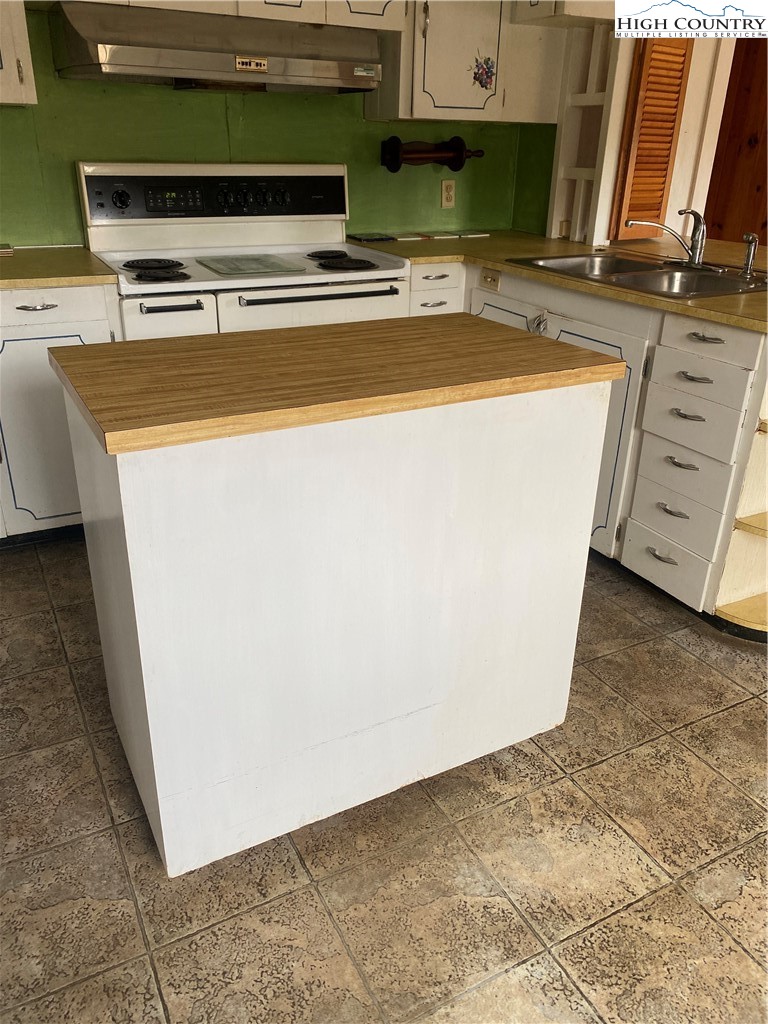 453 Smith Acres Road Ennice, NC 28623 - Photo 27 of 30 a view of water heater room