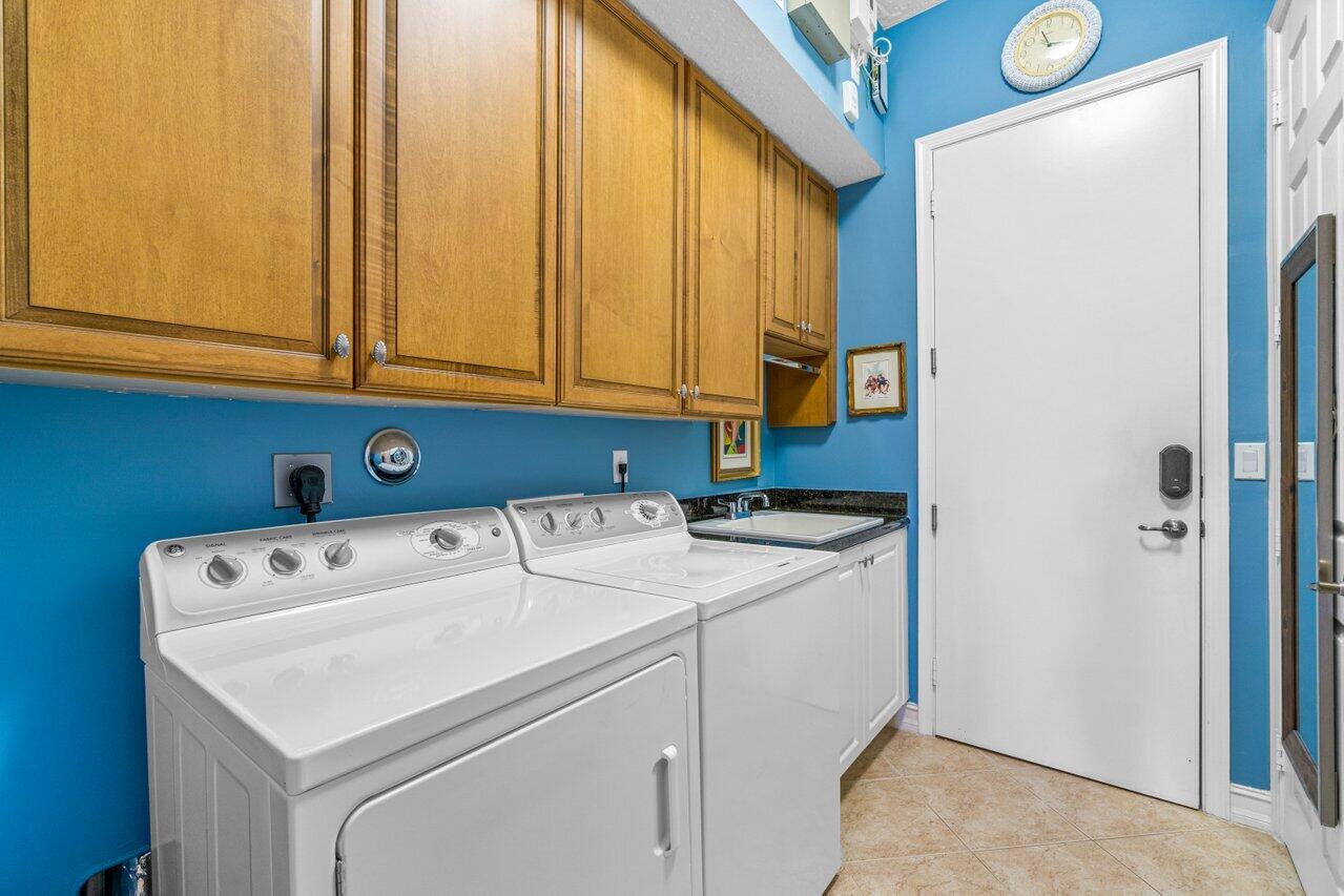 7071 Corning Circle Boynton Beach, FL 33437 - Photo 38 of 64 Laundry Room