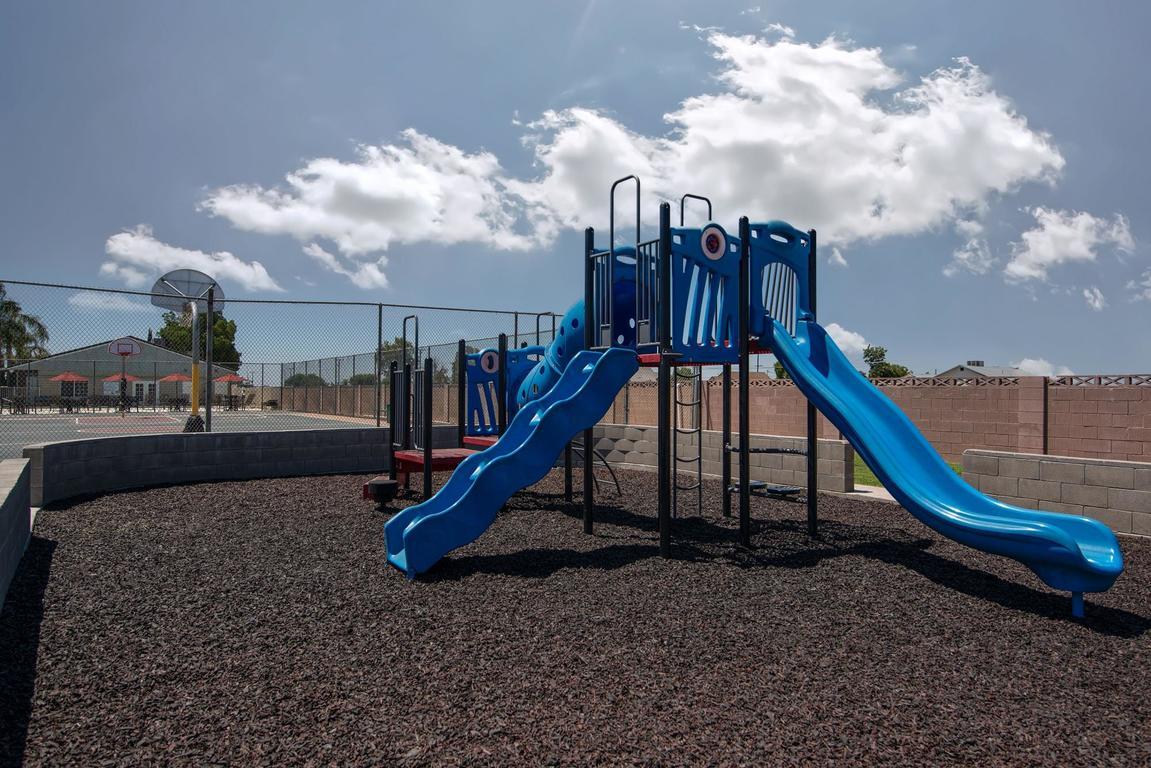 900 East Rankin Road, Unit 5 Tulare, CA 93274 - Photo 22 of 26 a view of a park with swings