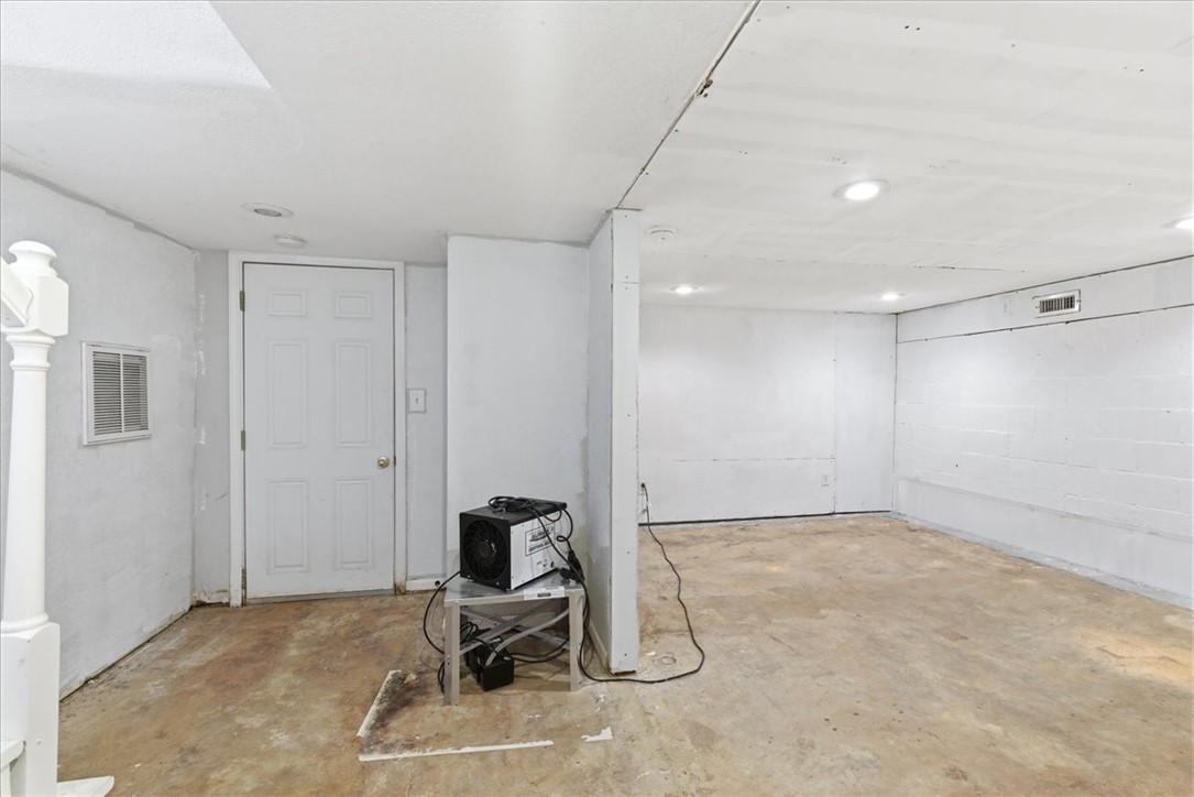 112 Newry Road Seneca, SC 29672 - Photo 18 of 19 This expansive basement offers an opportunity for a personalized living space.