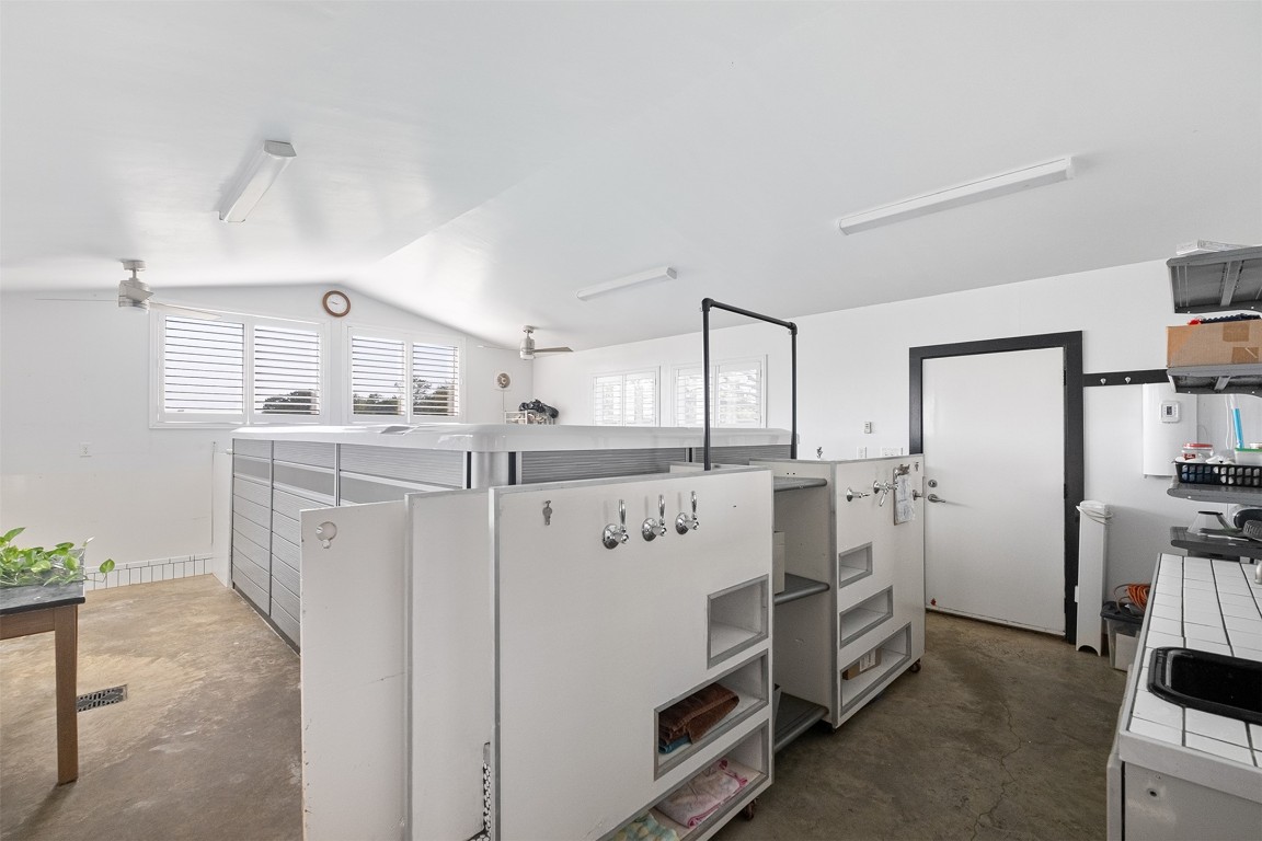 142 Zimmerhanzel Road Flatonia, TX 78941 - Photo 29 of 40 a utility room with cabinets washer and dryer