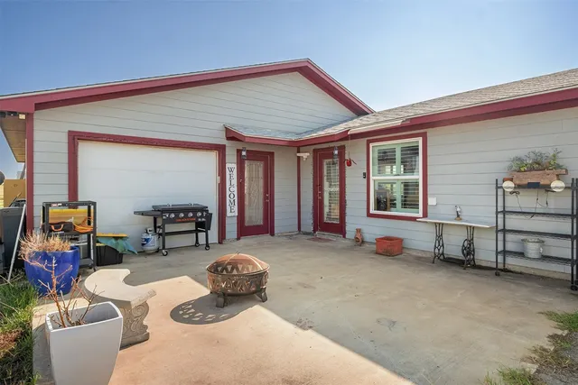 a view of a swimming pool and an outdoor space