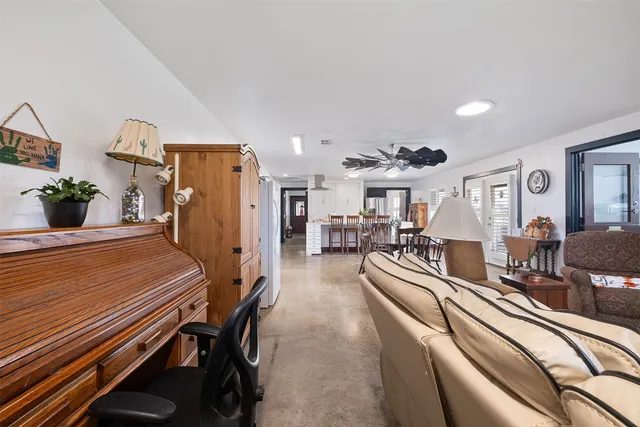 a living room with furniture and a couch