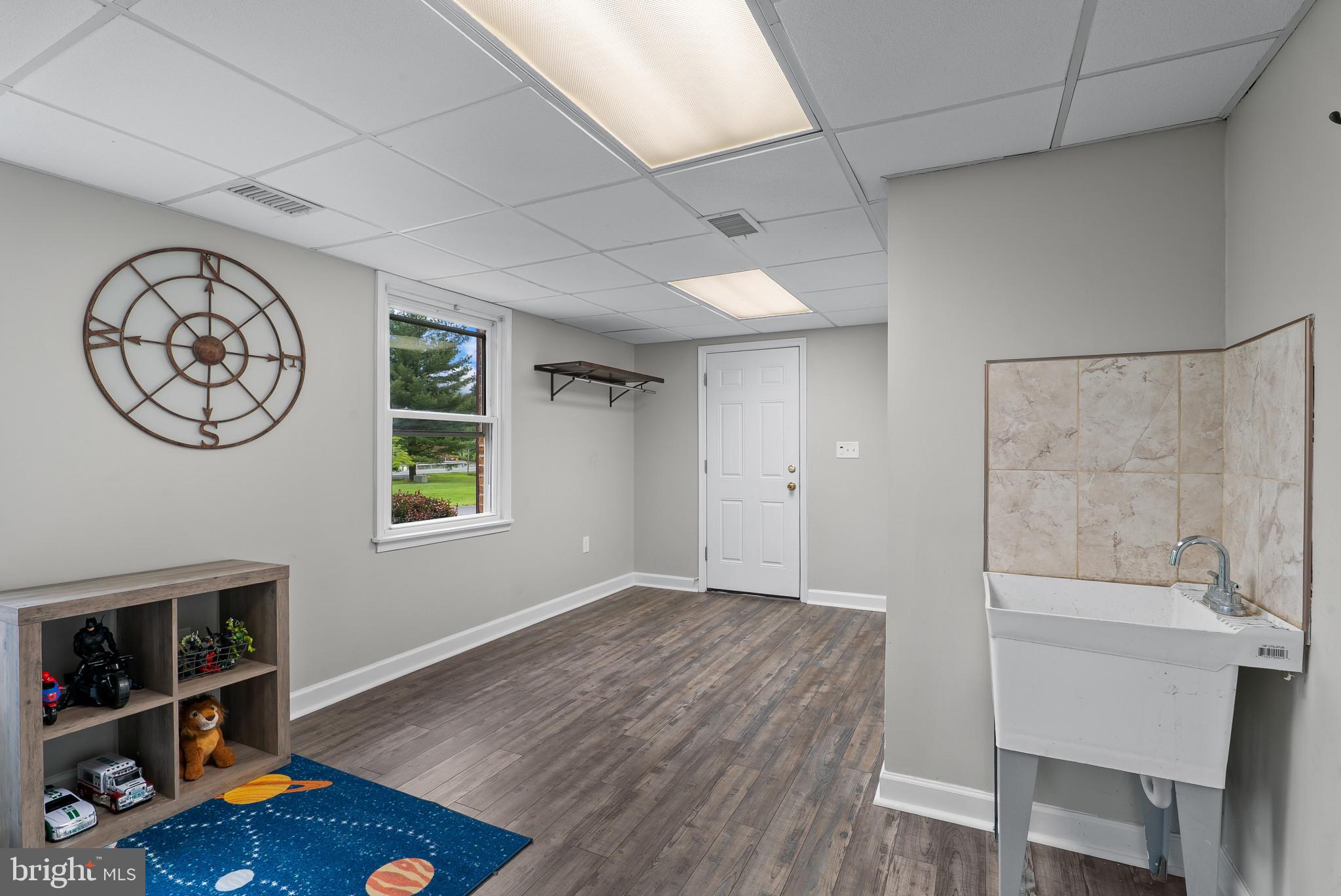 2607 Marston Road New Windsor, MD 21776 - Photo 15 of 45 Playroom between garage and family room