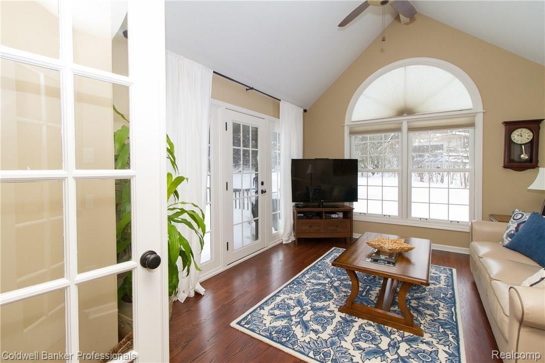 9150 Fox Hollow Road Clarkston, MI 48348 - Photo 14 of 58 Sunroom w/new hardwood floors!