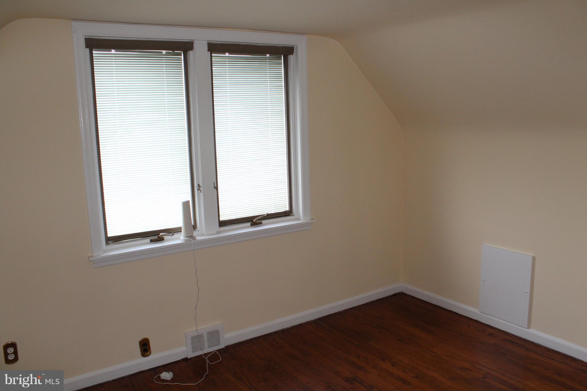 82 Baylor Road Hamilton, NJ 08610 - Photo 14 of 17 a view of a small space with wooden floor and a window