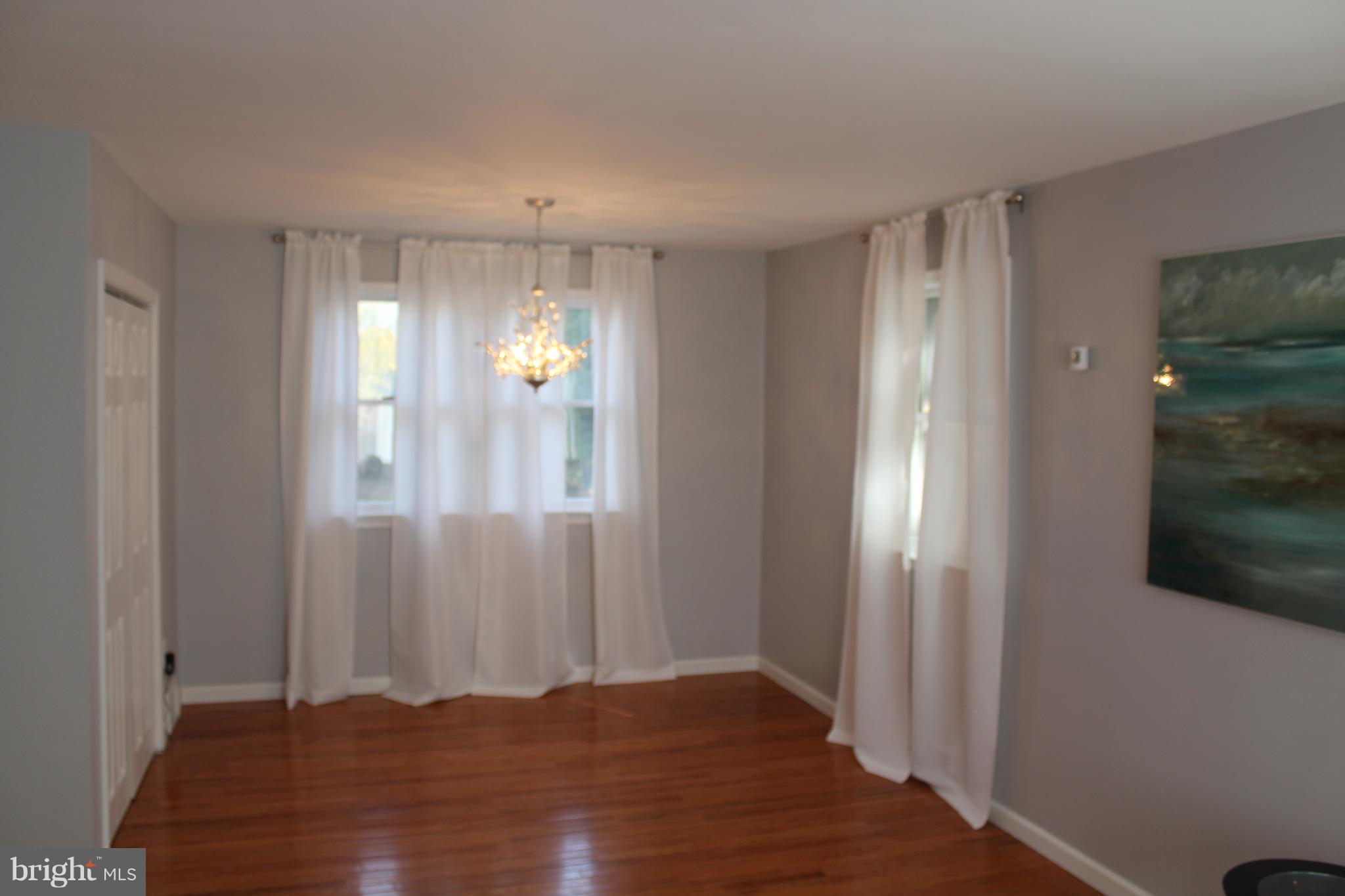 82 Baylor Road Hamilton, NJ 08610 - Photo 3 of 17 a view of entryway with wooden floor