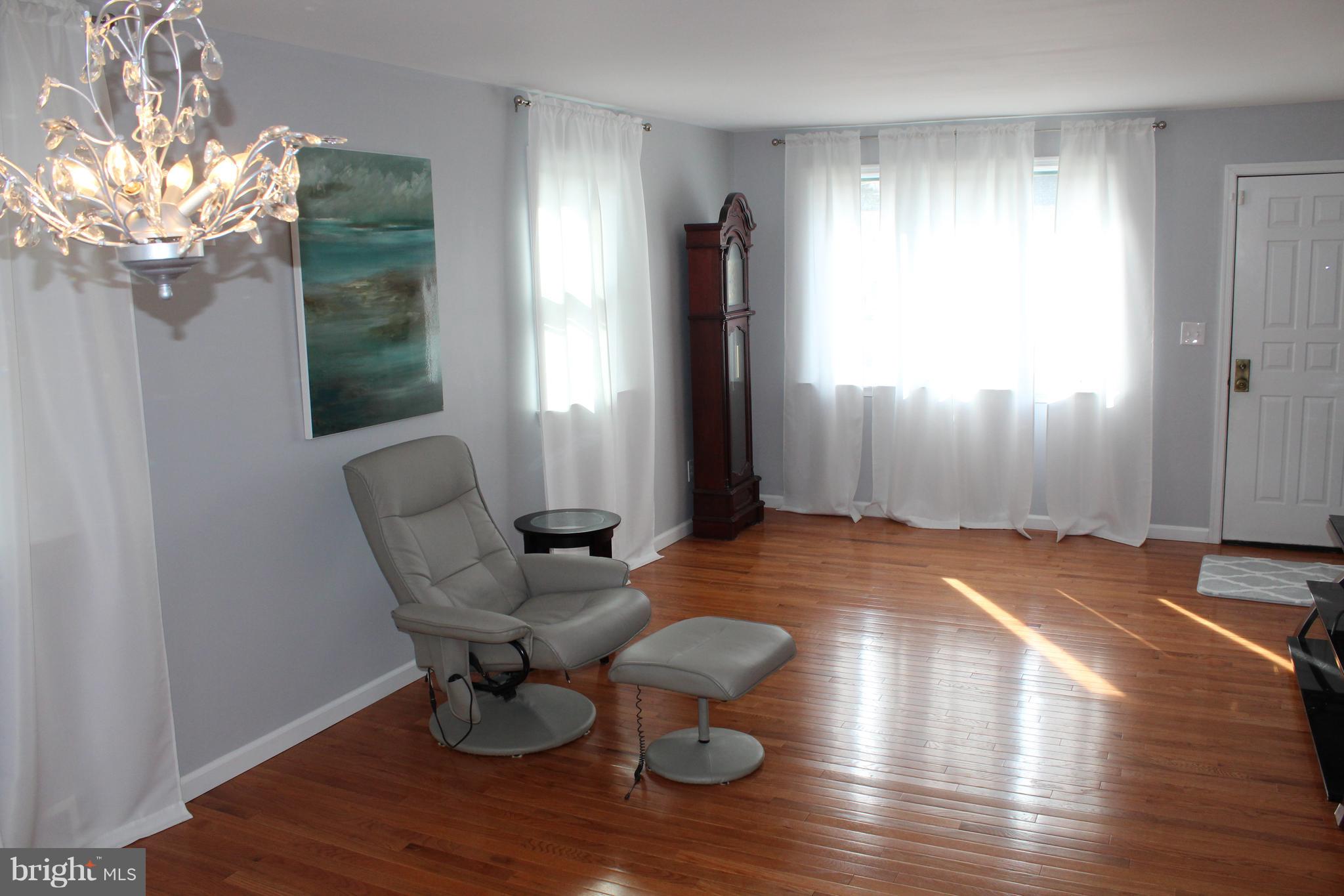 82 Baylor Road Hamilton, NJ 08610 - Photo 5 of 17 a view of livingroom with furniture and window