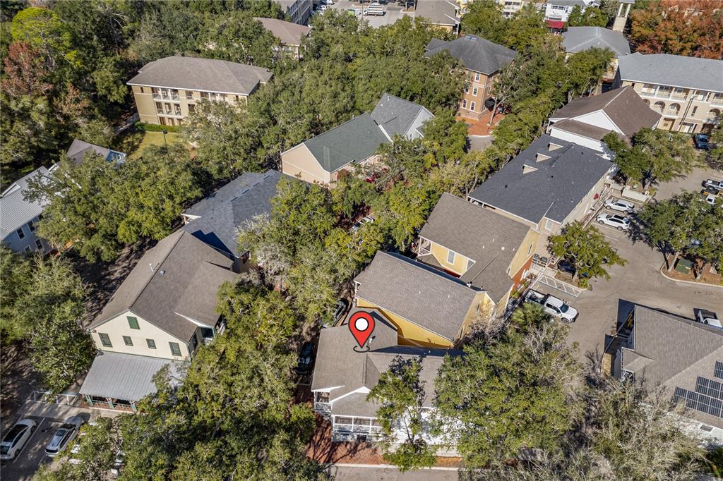 5213 Southwest 91 Terrace, Unit B Gainesville, FL 32608 - Photo 26 of 38 an aerial view of a house