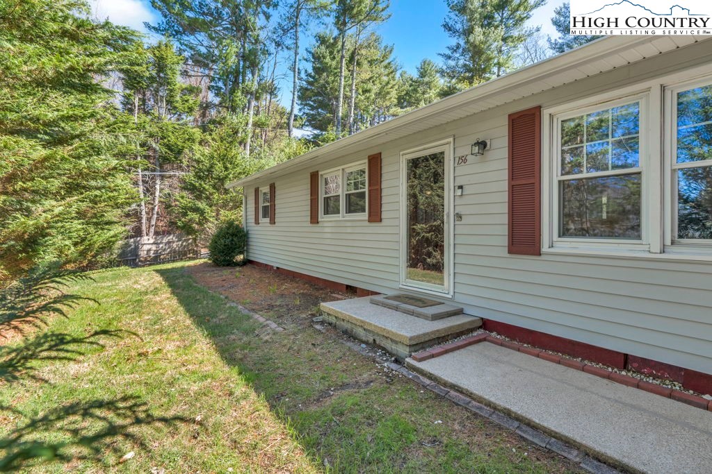 156 Olancha Avenue Boone, NC 28607 - Photo 1 of 23 a view of a house with a yard