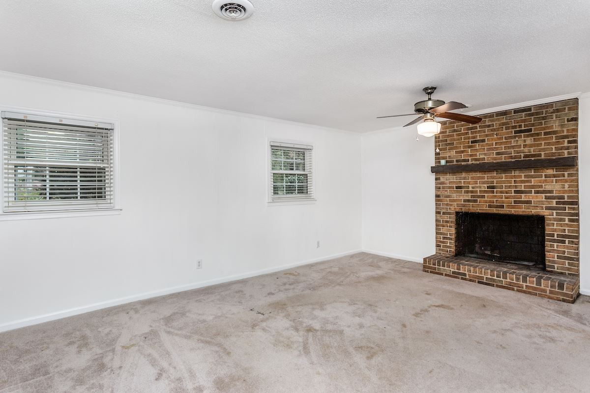1304 Medfield Road Raleigh, NC 27607 - Photo 20 of 30 Lower Level Fireplace