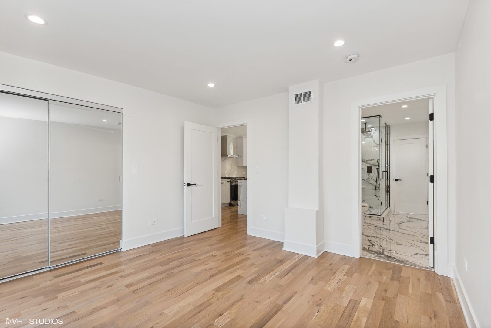 1025 Dewey Avenue Evanston, IL 60202 - Photo 11 of 21 a view of empty room with wooden floor