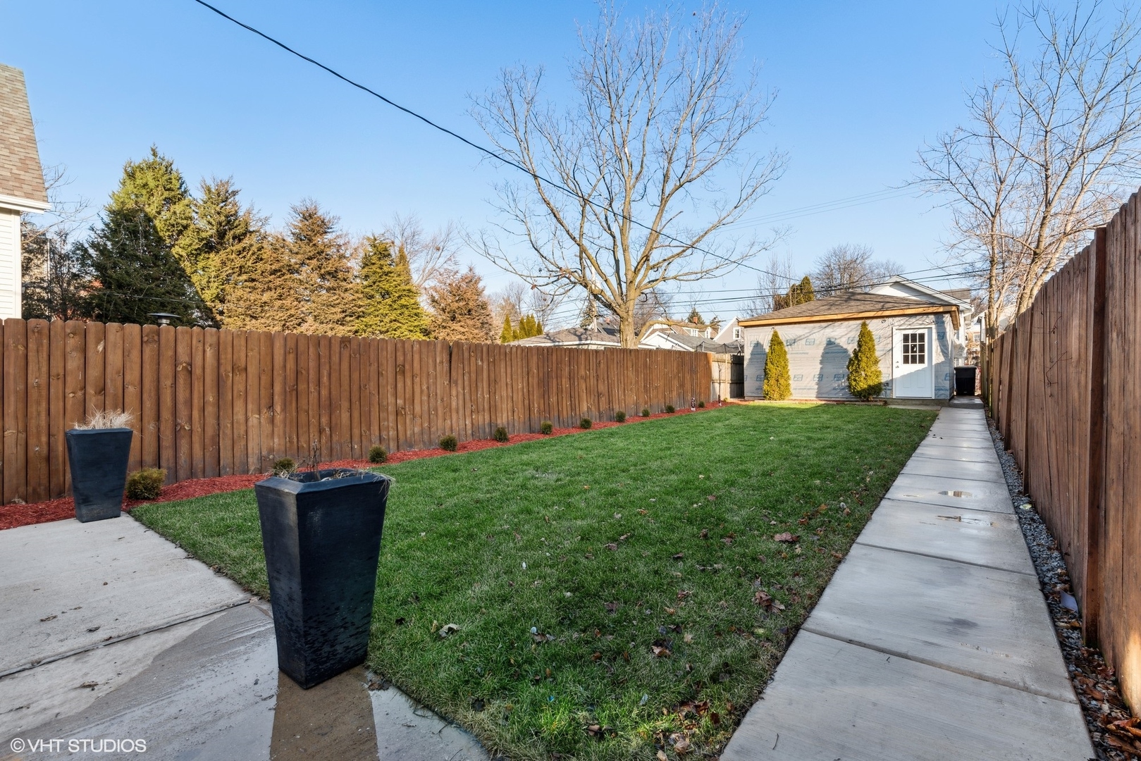 1025 Dewey Avenue Evanston, IL 60202 - Photo 15 of 21 a front view of a house with garden