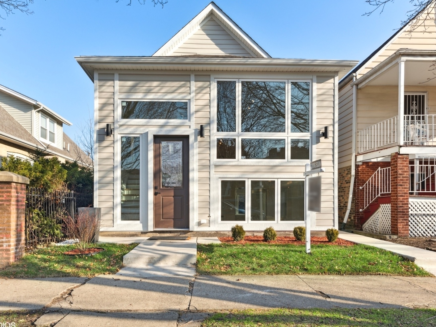 1025 Dewey Avenue Evanston, IL 60202 - Photo 21 of 21 a front view of a house with a yard