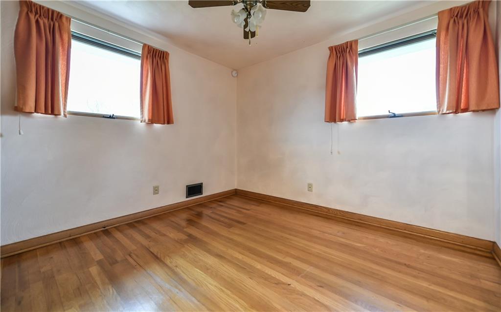 3891 Anderson Road Gibsonia, PA 15044 - Photo 13 of 22 Bedroom with plenty of light and ceiling fan.